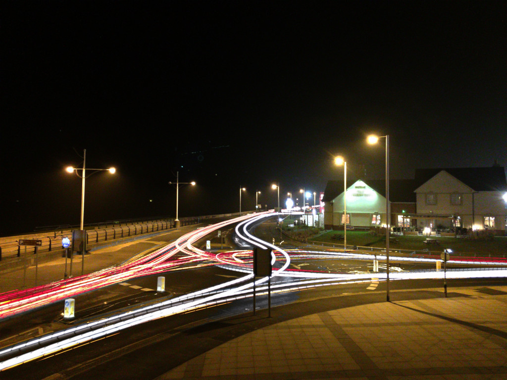 Photo of light trails from traffic at night