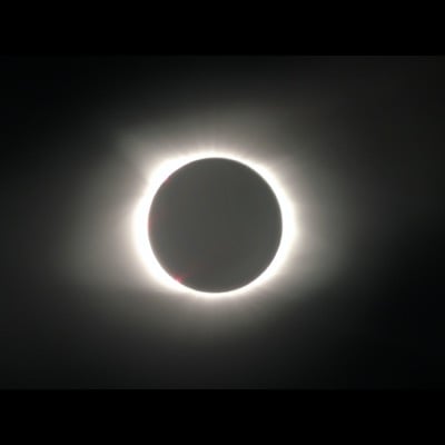 Total eclipse by Jim Opalek. Settings: Taken through telescope