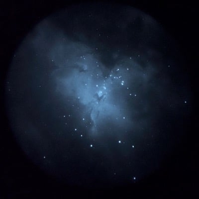 Eagle Nebula with Pillars of Creation by Ray Taylor. Settings: Long Exposure mode, taken through telescope with NVD