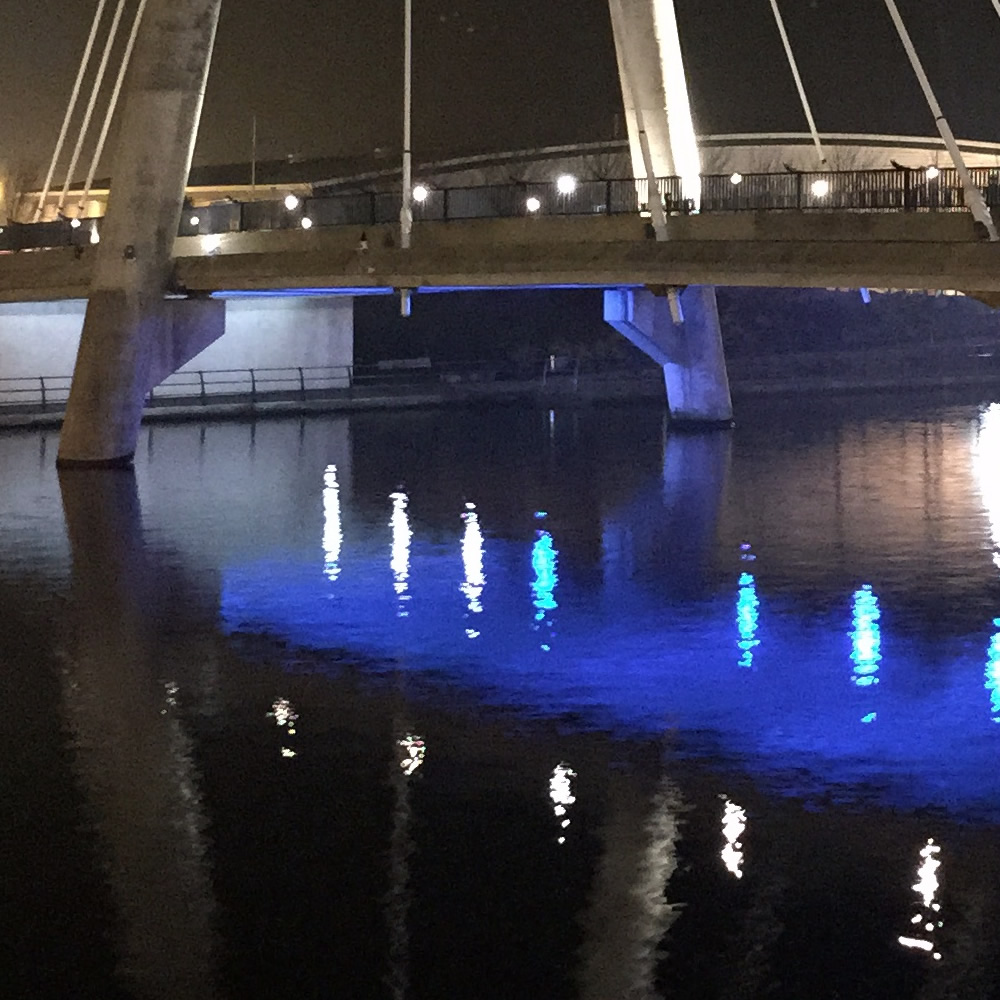 Standard photo, water reflections are rippled by the waves